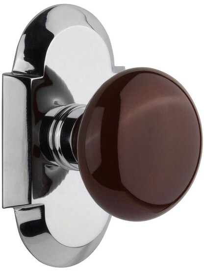 Arched Rosette Door Set with Brown Porcelain Knobs in Polished Chrome.